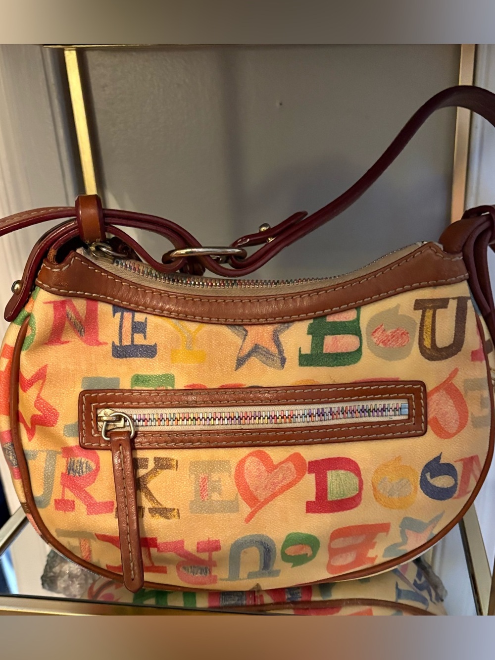 Dooney & Bourke Multicolor Letter Print Shoulder Bag with Brown Leather Trim